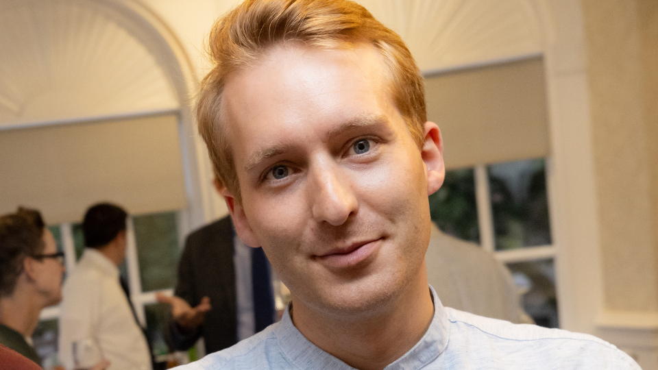 Lukas Meier smiles at viewer