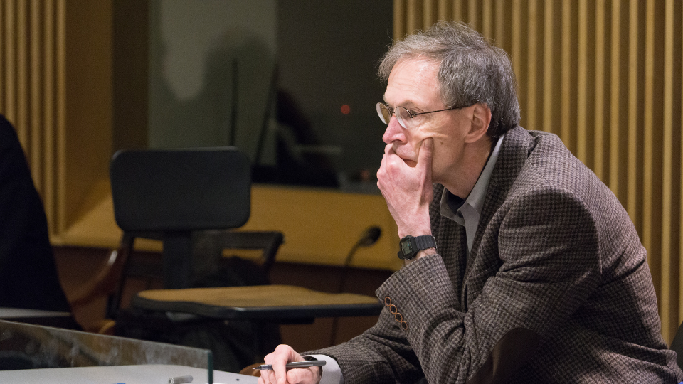 Fallon listens to a public lecture at the Center in 2016.