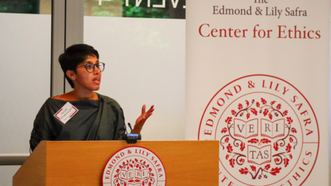 Sonali Chakravarti speaks at a podium
