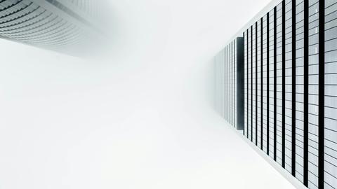 corporate buildings in clouds