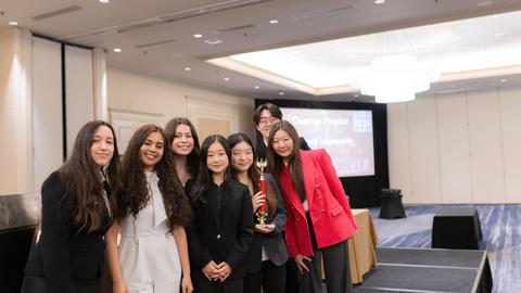 Ethics Bowl Team with Trophy