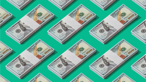 stacks of money against a green background